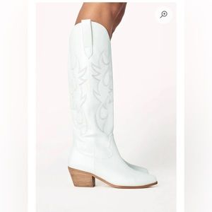 Tall white cowboy boots